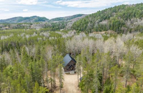 Mauricie Casa | L'Inukshuk - Chalet en bois ave Spa