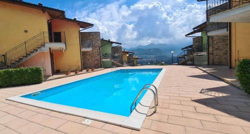 Tavernola Apartamento | La casa di Gabry in residence con piscina comune