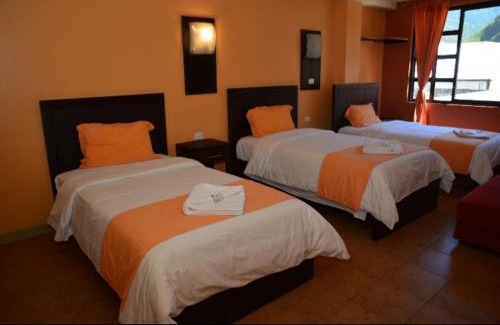 Baños de Agua Santa Hotel | La Chimenea Casa De Piedad