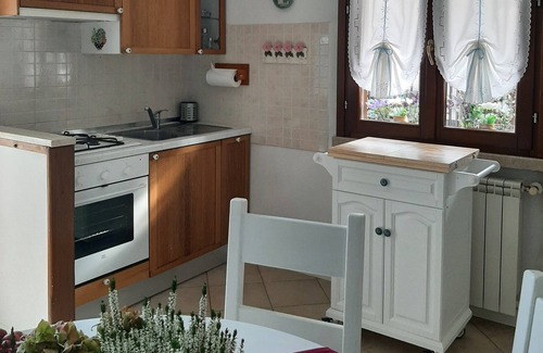 Nave Apartamento | La Civetta, elegant one-bedroom apartment with garden, private parking 10min from the city