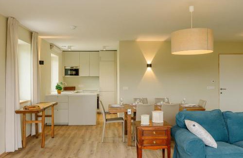 Ciney Casa | La Ferme d'Auwez - Horizon - Gîte 6 pers avec piscines et sauna