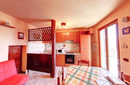 Tavernola Casa | La Magotina - Vista panorámica del lago Iseo - C. I.R. 016211-CNI-00004
