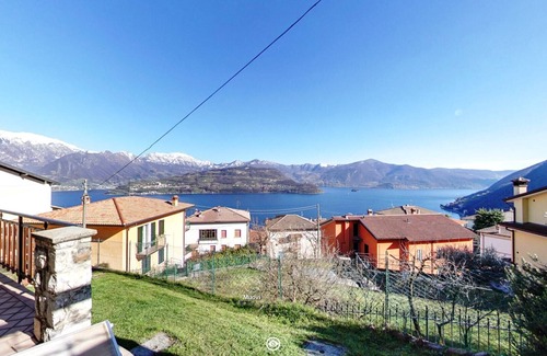 Tavernola Casa | La Magotina - Vista panorámica del lago Iseo - C. I.R. 016211-CNI-00004