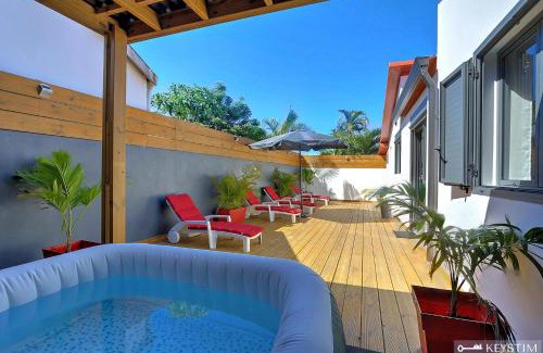 Petite-ÃŽle Villa | La Maison Du Bonheur - Villa moderne avec SPA