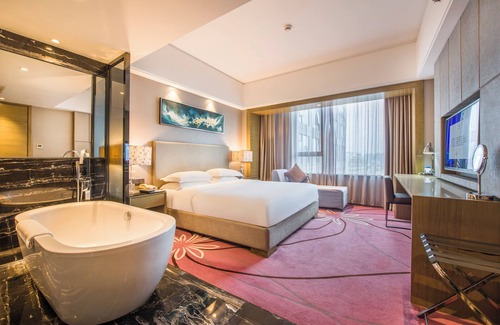 Tianhe Hotel | La Perle International Hotel - Free shuttle between hotel and Exhibition Center during Canton Fair & Exhibitor registration Counter