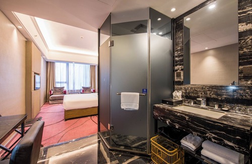 Tianhe Hotel | La Perle International Hotel - Free shuttle between hotel and Exhibition Center during Canton Fair & Exhibitor registration Counter