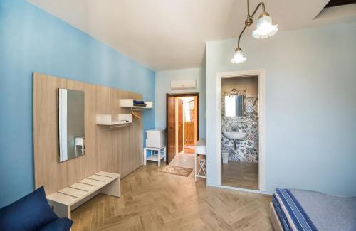 Maratea Casa | La stanza dell'angolo