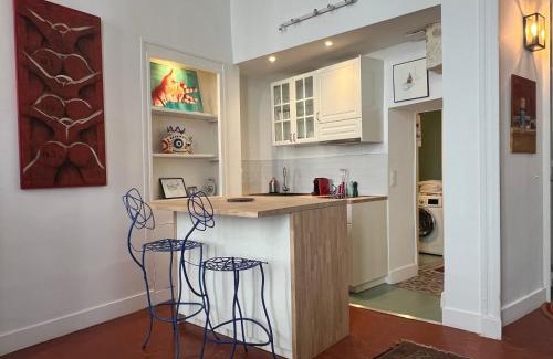 Ecusson Apartamento | LA SUITE - Appartement Centre Historique