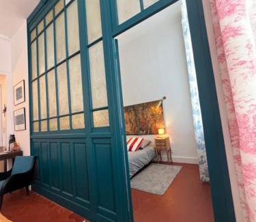 Ecusson Apartamento | LA SUITE - Appartement Centre Historique