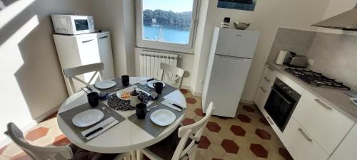 Le Grazie Casa | La Terrazza sulla baia di Le Grazie