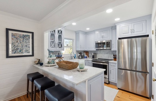 Pelican Bay Casa | Lagoon view, screen porch w/ swing bed, Pool, near beach - 3 Pelican Bay