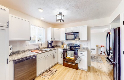Indianapolis Casa | Laid-Back Indy Home with Patio, Grill, Firepit Area, Smart TVs - Dog-Friendly