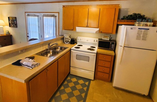 Blue Eye Cabaña | Lake "Beach" Cottage w/Boat Slip & Rentals, Dock & Hot Tub!