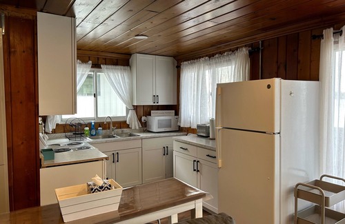National City Cabaña | Lake/beach front property with kayaks, pedal boat, & row boat, near Tawas Bay