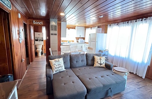 National City Cabaña | Lake/beach front property with kayaks, pedal boat, & row boat, near Tawas Bay