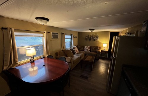Buchanan Dam Cabaña | Lake Buchanan Water Front Cabin ~ Hot Tub, Fire Pit lounge, Grill, Kayaks.