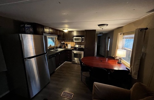 Buchanan Dam Cabaña | Lake Buchanan Water Front Cabin ~ Hot Tub, Fire Pit lounge, Grill, Kayaks.