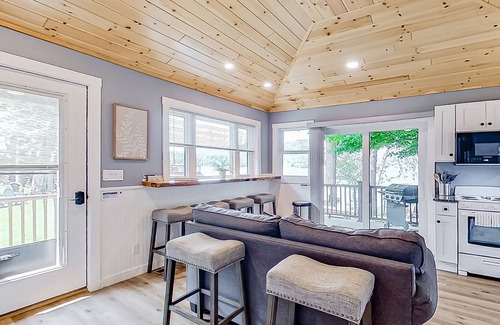 Lake George Cabaña | Lake cabin with waterfront views, shared dock, private deck, grill, & kayaks