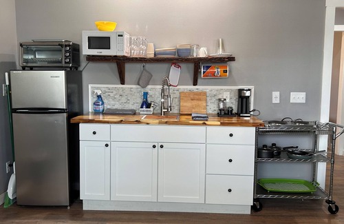 Southport Cabaña | Lake Front Rental in Panama City with Kayak, EV Charger, & Dock - Dog Friendly