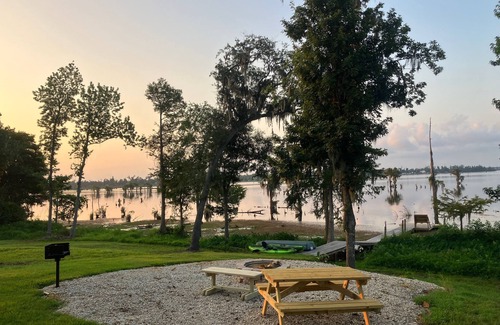 Southport Cabaña | Lake Front Rental in Panama City with Kayak, EV Charger, & Dock - Dog Friendly