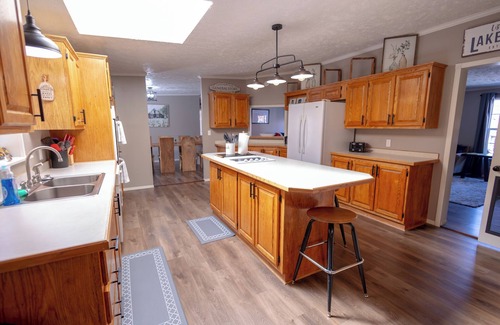 Brixey Casa | Lake Longbow-10 acre STOCKED lake, 80 acres, 4-wheeler/walking trails, swimming
