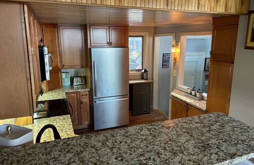 Gilford Condominio | Lake-view townhome at Samoset with pools, beach, WiFi, & AC