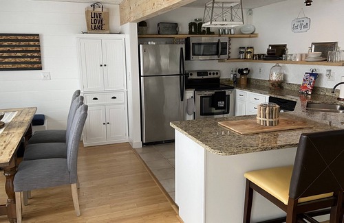 Thayerville Casa | Lakefront, 3 Amazing Decks, Tennis/Pickle Ball, Boat Slip, Hot Tub, Bed Swing