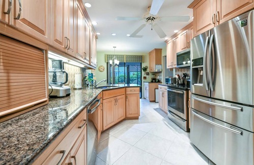 Pelican Bay Casa | Lakefront 3 bedroom, 2 bath home in gated community. Walking distance to beach.