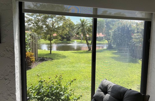 Pelican Bay Casa | Lakefront 3 bedroom, 2 bath home in gated community. Walking distance to beach.