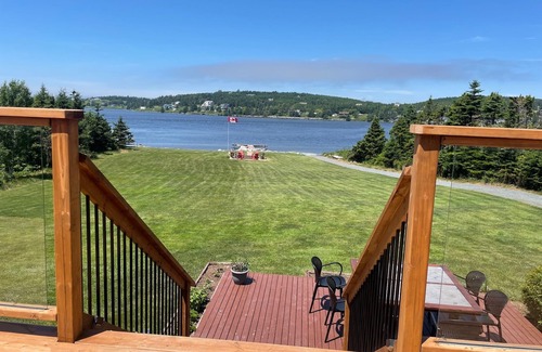 East Lawrencetown Casa | Lakefront home near Lawrencetown Beach with private sauna, hot tub and cold bath
