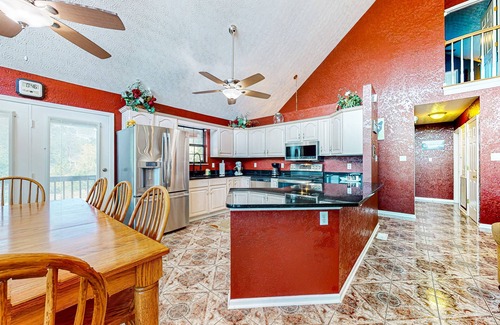 Sevierville Cabina | Lakefront cabin with views, boat ramp, dock, hot tub, & free attraction tickets