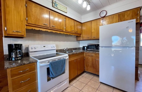 Stevensville Casa | Lakefront Chalet #25 w/ Beach Access, Pools, Sport Courts, Fishing Pond & more!