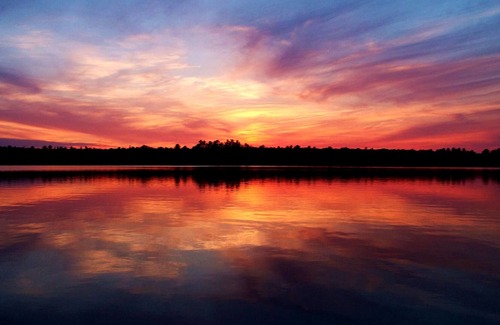 Leeds and the Thousand Islands Cabaña | Lakefront, colourful sunsets, hot tub, arcade. Year round fun and relaxation.