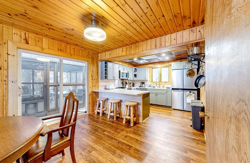 Lac du Flambeau Cabaña | Lakefront dog-friendly retreat with sauna, dock, canoe, paddle board, & firepit