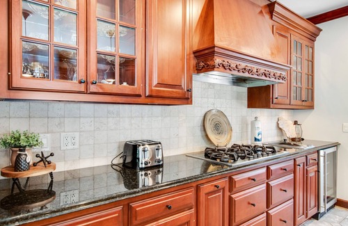 Arkdale Casa | Lakefront estate with firepit, grill, game room & sauna - near Sand Valley Golf