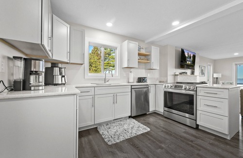 Prudenville Casa | Lakefront - Spacious Family Getaway with Dock!