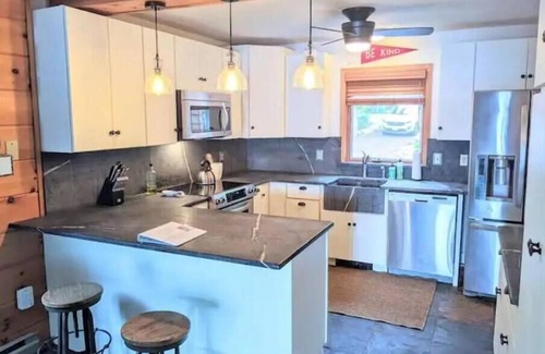 Lake Harmony Estates Casa | Lakefront home offering private dock, beach, fishing and kayaks for activities.