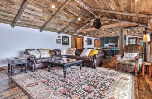 Presque Isle Cabina | Lakefront home on snowmobile trail with kayaks/SUP, fireplace, game room & AC