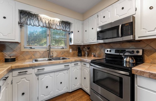 Mount Mourne Casa | Lakefront Home w/Dock, Game Room & Hot Tub | Ponderosa Peninsula by AvantStay