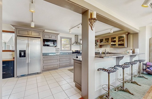 Franklin Casa | Lakefront home with gym, game room, home theatre, & private beach with boathouse