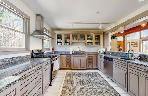 Franklin Casa | Lakefront home with gym, game room, home theatre, & private beach with boathouse