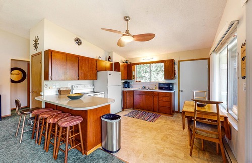 Rathdrum Casa | Lakefront home with private dock, large yard, wood stove, firepit, grill, W/D