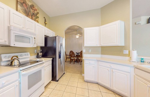 Beachwalk Isles Casa | Lakefront home with private heated outdoor pool, enclosed lanai, & central AC