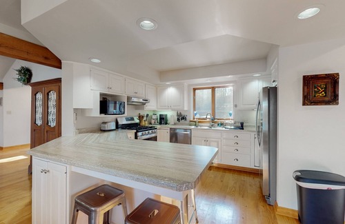 Hazelhurst Casa | Lakefront home with private outdoor sauna, dock, firepit, wood fireplace & patio