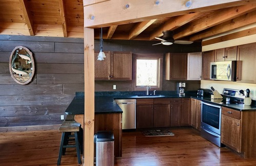 Butler Cabina | Lakefront Lullaby-Rustic cabin w/ lake views, boatslip, hot tub & fiber internet