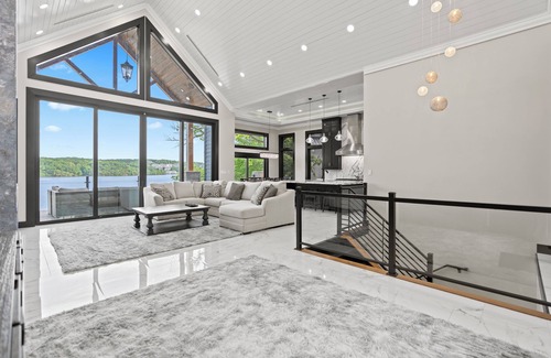 Sunrise Beach Casa | Lakefront Luxury 7 bed Home with Private Dock, Swim Spa on 13MM in Porto Cima