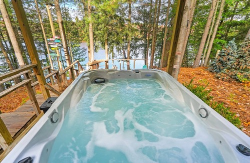 South Boardman Casa | Lakefront retreat 30 min to Traverse City. Hot tub, fire pit, kayaks, game room.