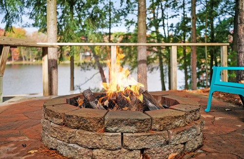 South Boardman Casa | Lakefront retreat 30 min to Traverse City. Hot tub, fire pit, kayaks, game room.