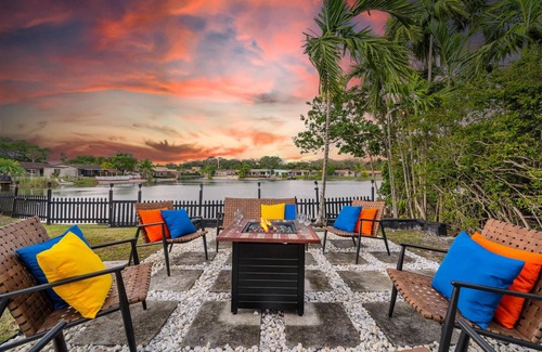 Ojus Casa | Lakefront Retreat Perfect for Family Fun With Heated Pool, King Bedroom, Lake Vi
