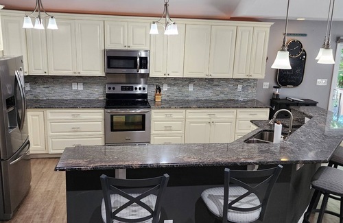 Littleton Casa | Lakefront single-story home, Flat lot! Huge game room!